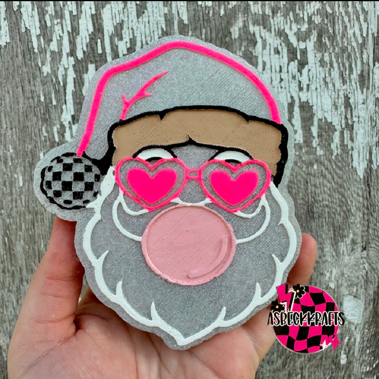 Santa blowing bubble