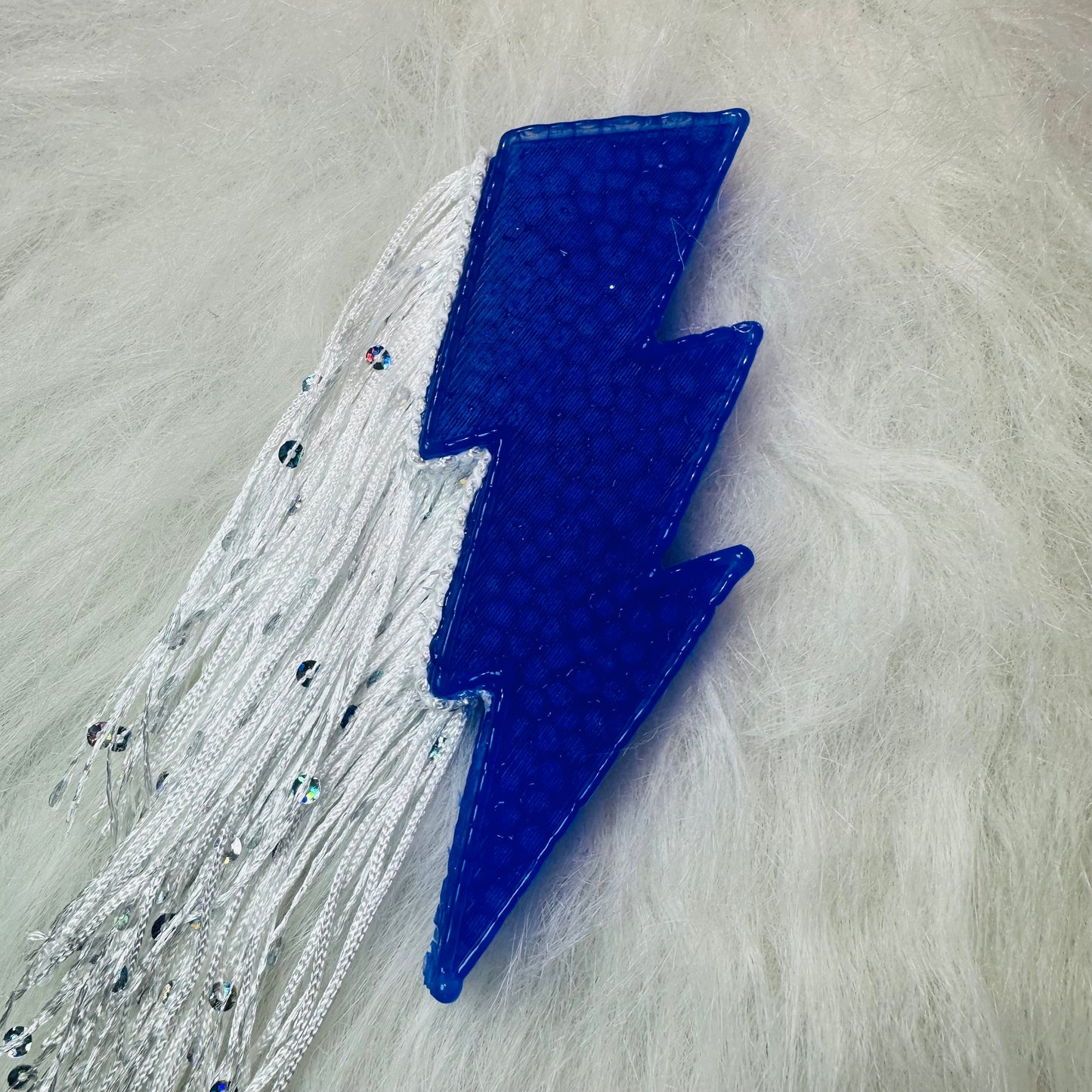 Royal blue lighting bolt with fringe