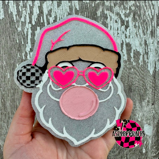 Santa blowing bubble