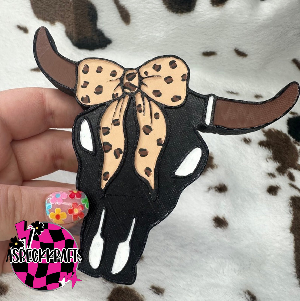 Bull with Cheetah Bow